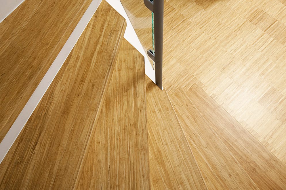 Trap met Density® bamboe traptreden die overgaat in een Bamboo Industriale vloer